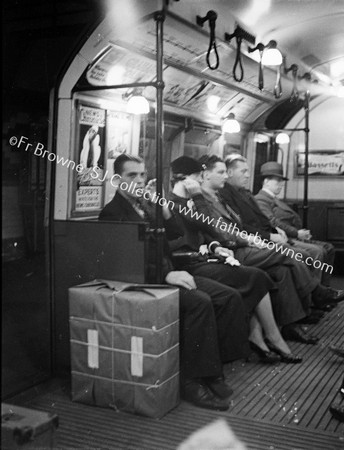 PASSENGERS IN TUBE  PICADILLY LINE